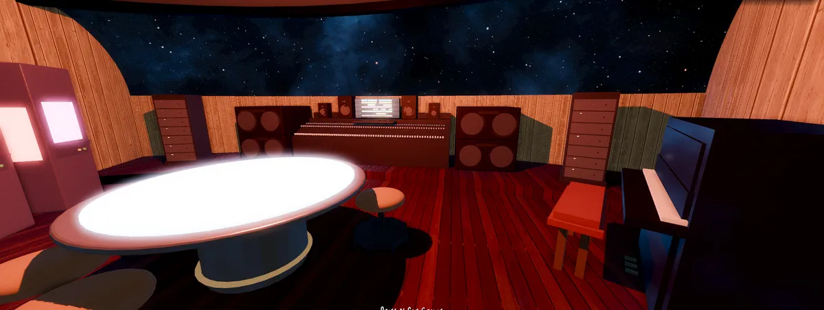 The nav room, with a glowing table and a wall of speakers